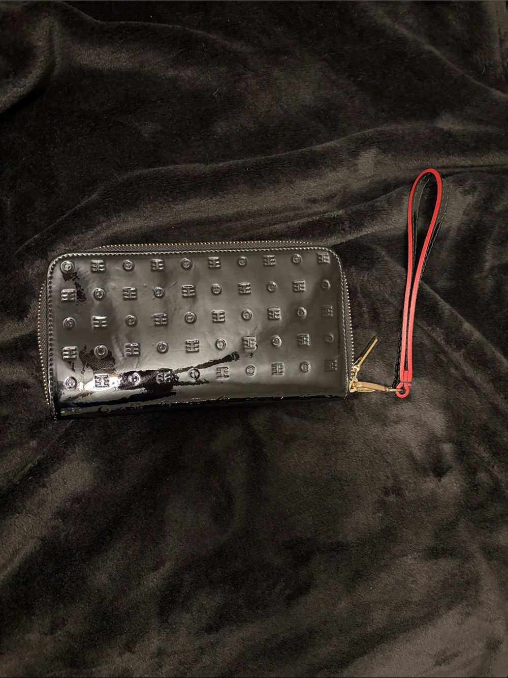 Arcadia Black Patent Zip-Around Phone Wristlet with Red Strap